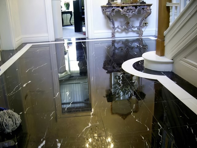 Polished marble floor restored to a mirror finish